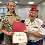 
Lola Estrem with Detachment Eagle Scout Liaison Jerry Van Hecke at Court of Honor -- 10.27.2024